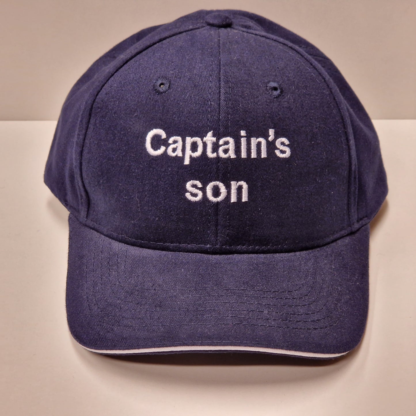 Caps, blå, Captain's Son