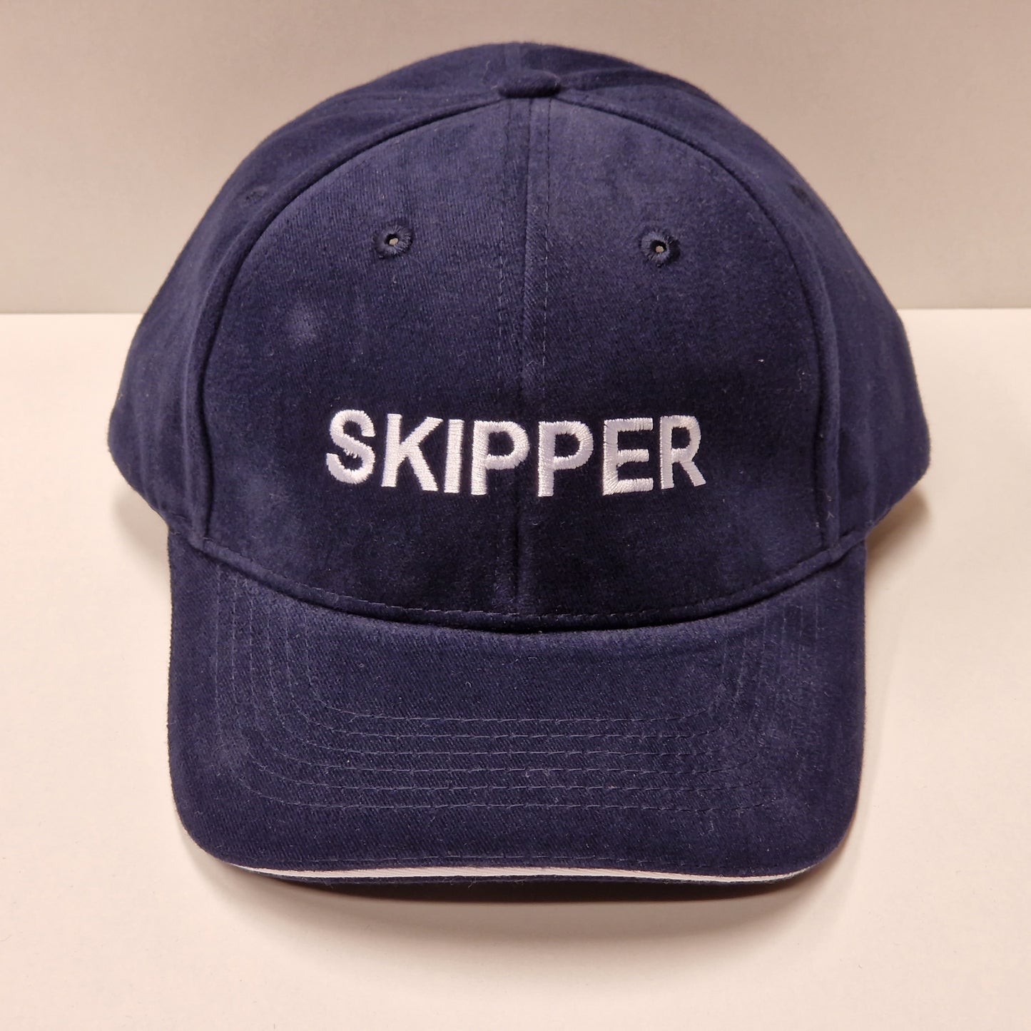 Caps, blå, Skipper